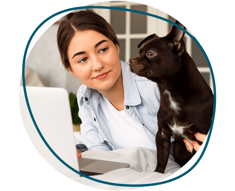 woman with laptop and dog